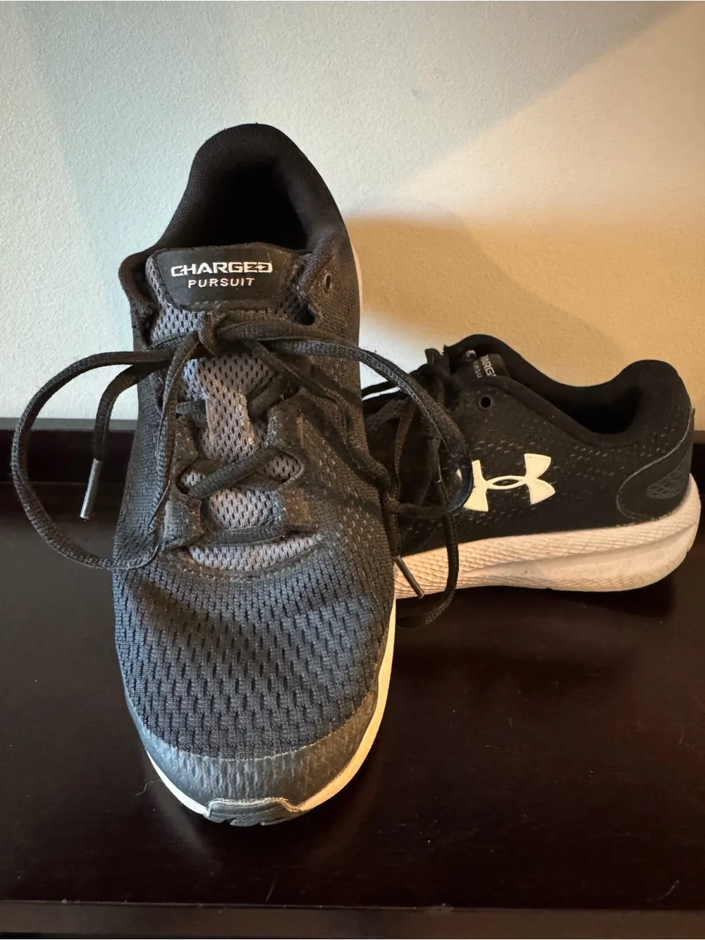 Youth 7 Under Armour Charged Pursuit Black sneakers